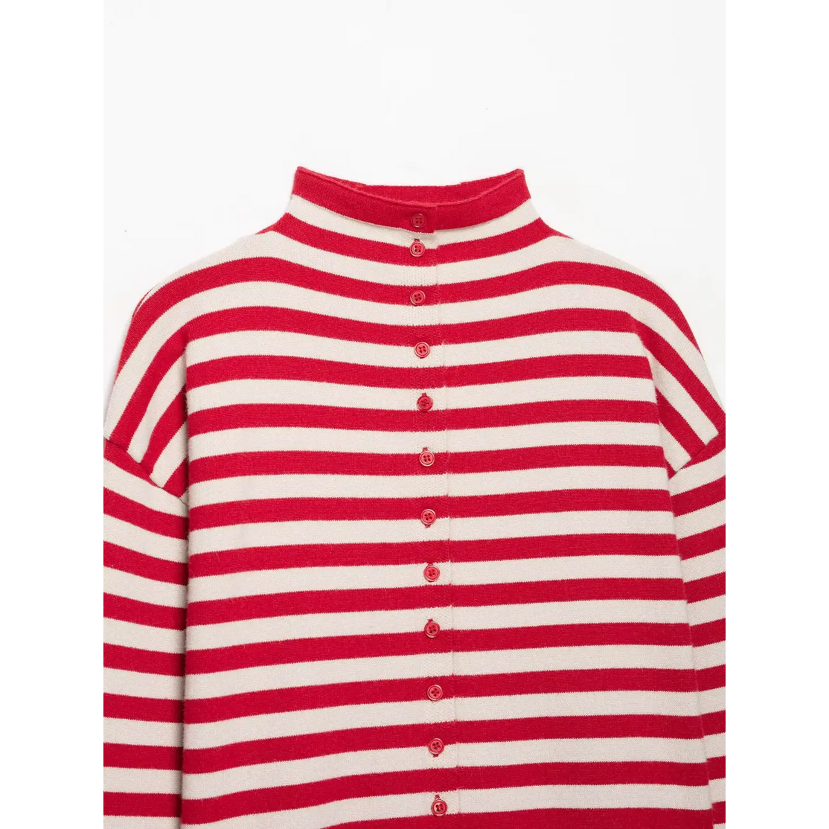 Close-up of upper bodice with red round buttons on red and cream striped cardigan