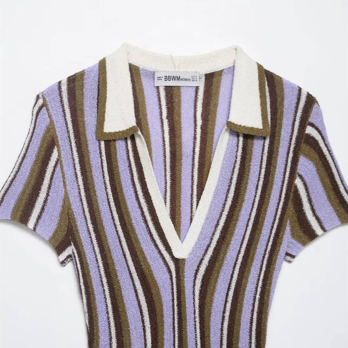 Front view of the striped knit mini dress, showing the polo collar, deep V-neck, and short sleeves