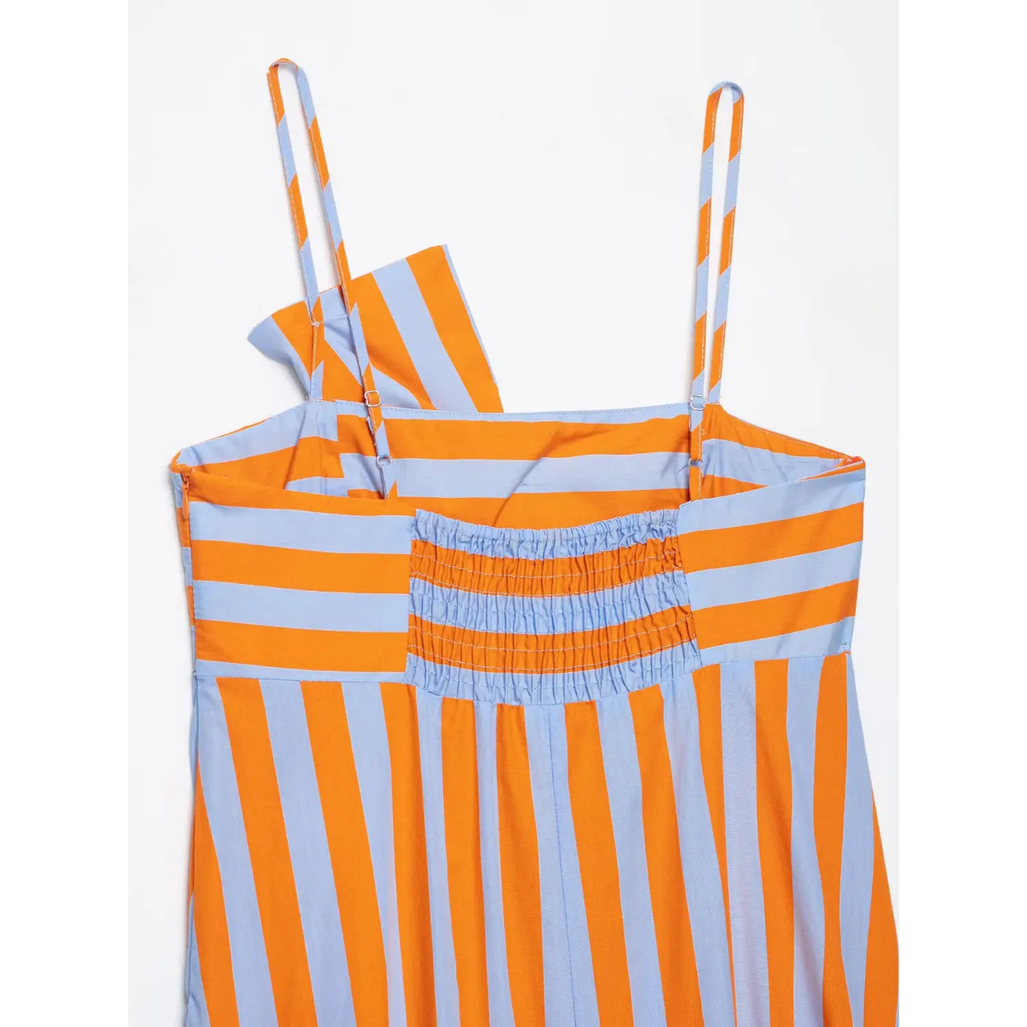 Back view orange light blue striped maxi dress with elastic smocked panel & adjustable spaghetti straps