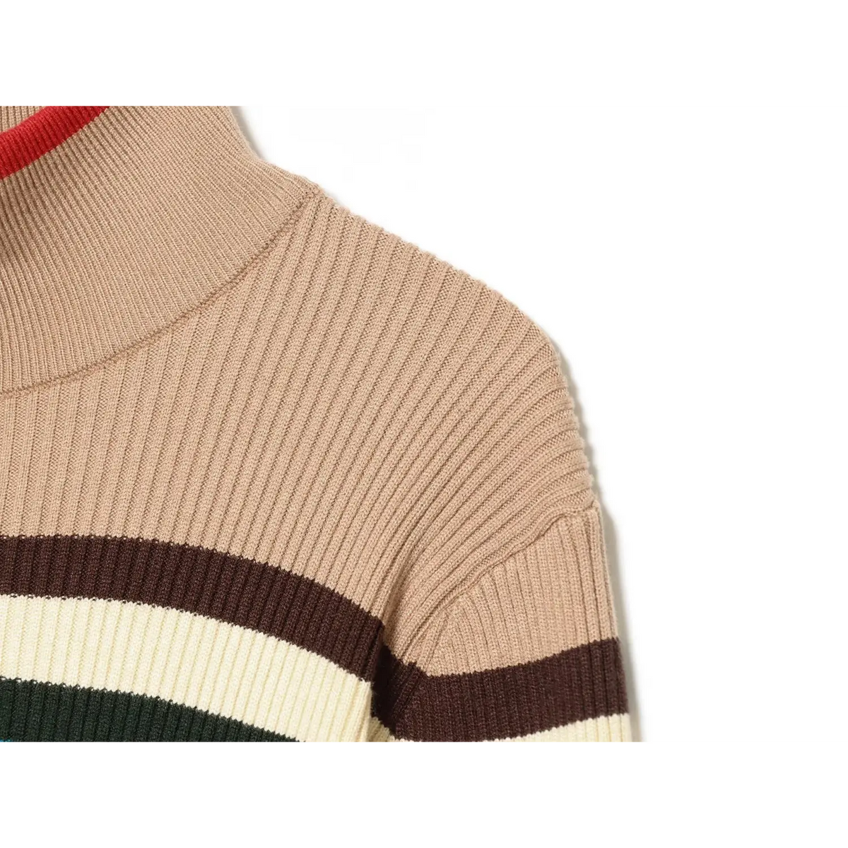 Close-up of ribbed knit shoulder seam and stripes
