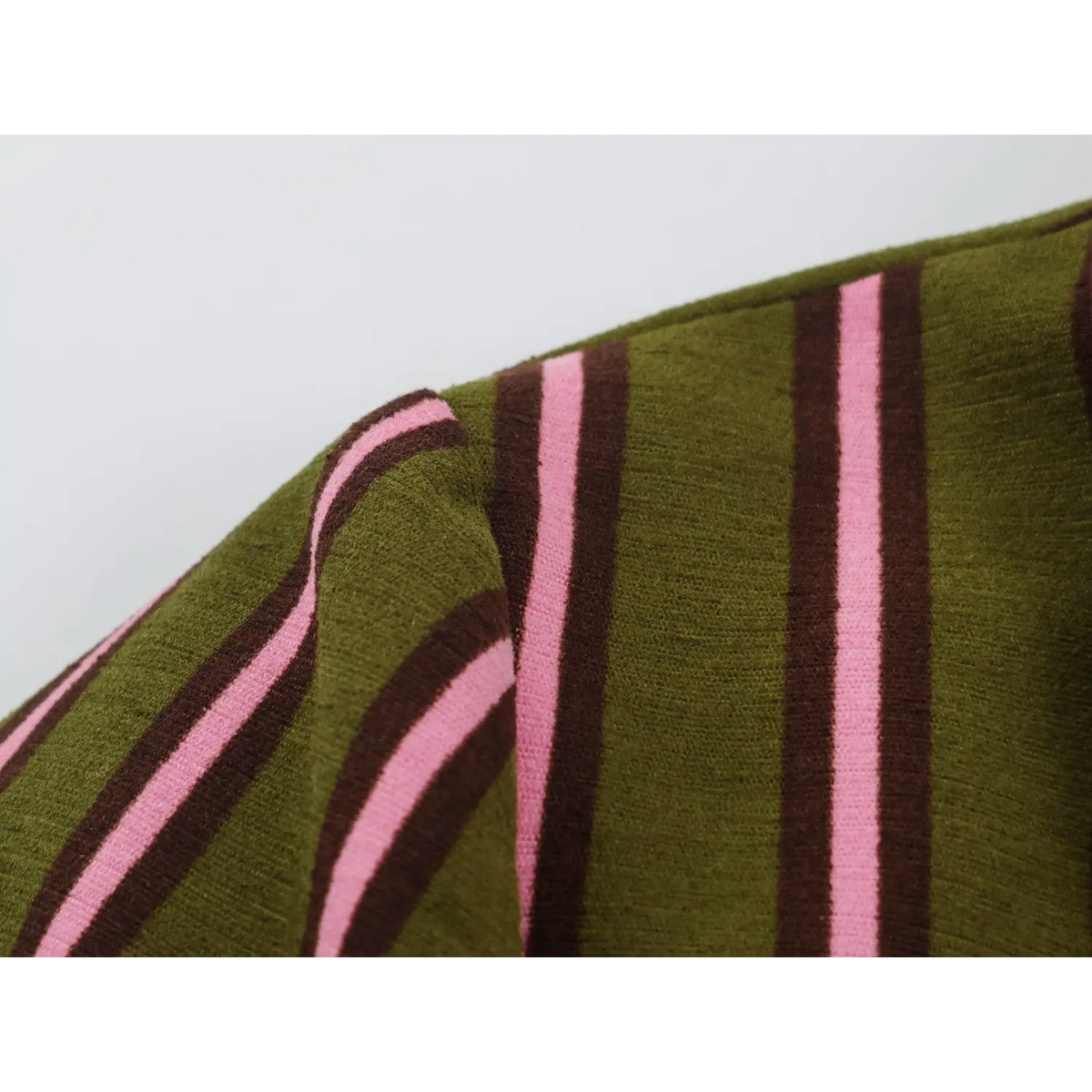 Close-up of shoulder seam and stripe texture