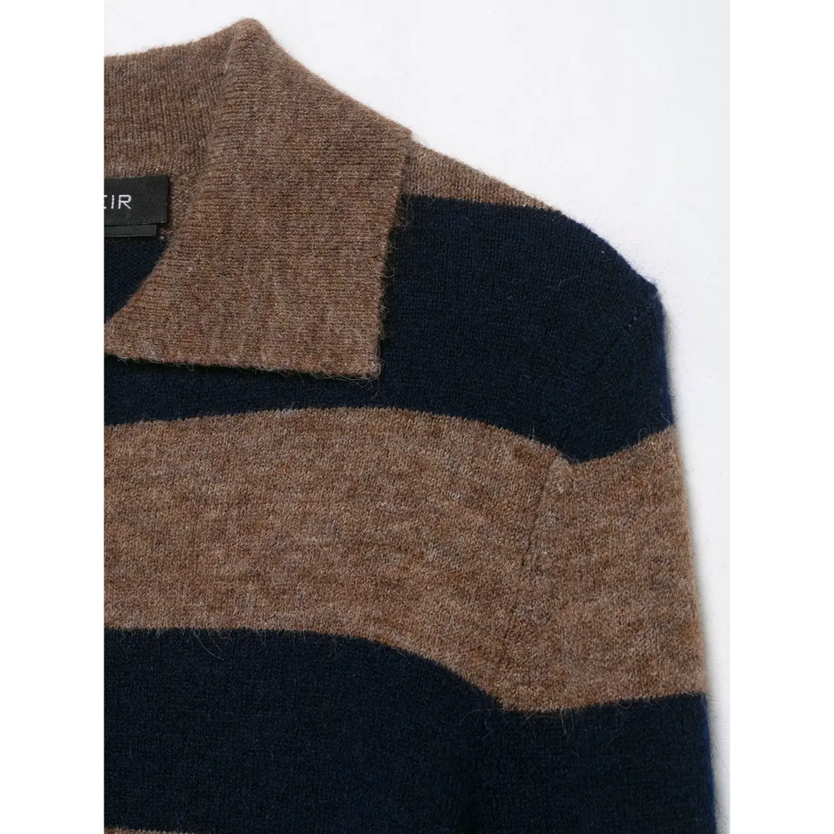 Close-up of brown navy striped shoulder and inner label