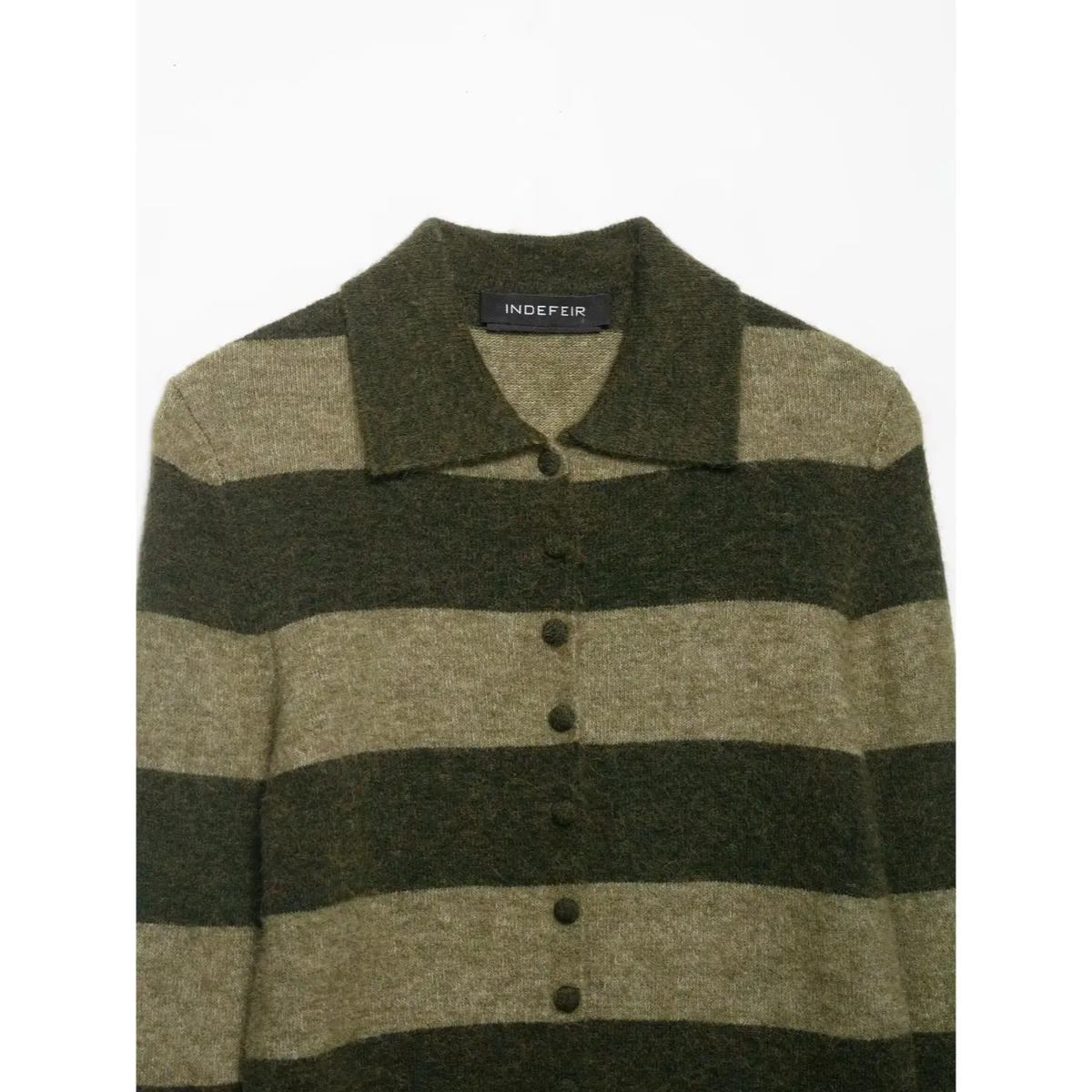 Close-up of olive striped polo collar and buttons