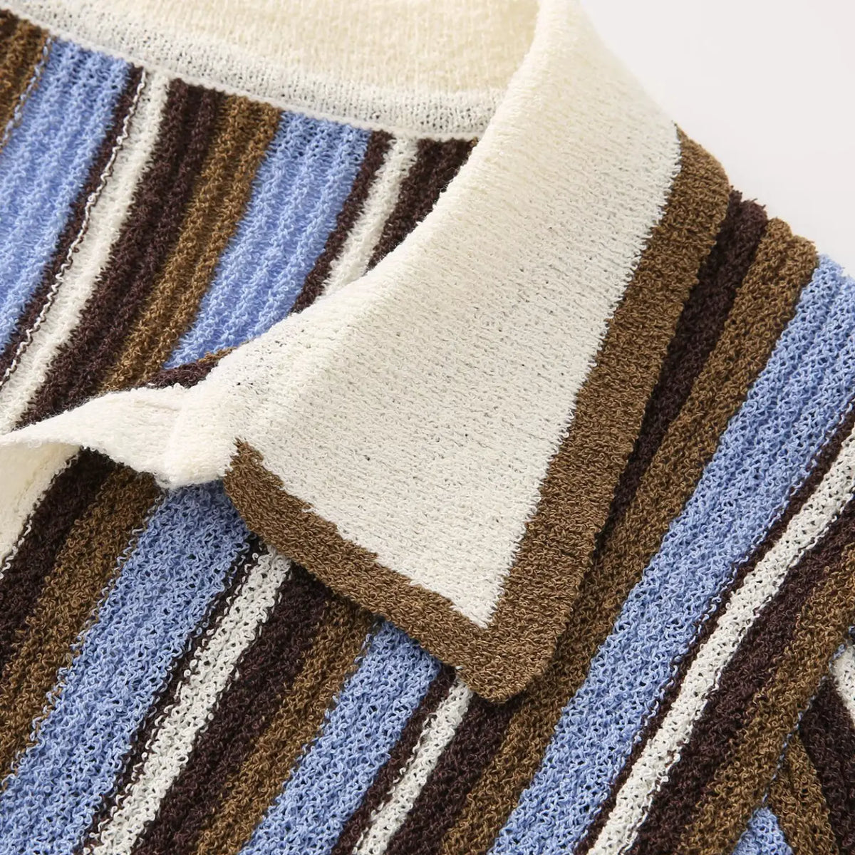 Close-up of blue brown striped collar point and brown trim