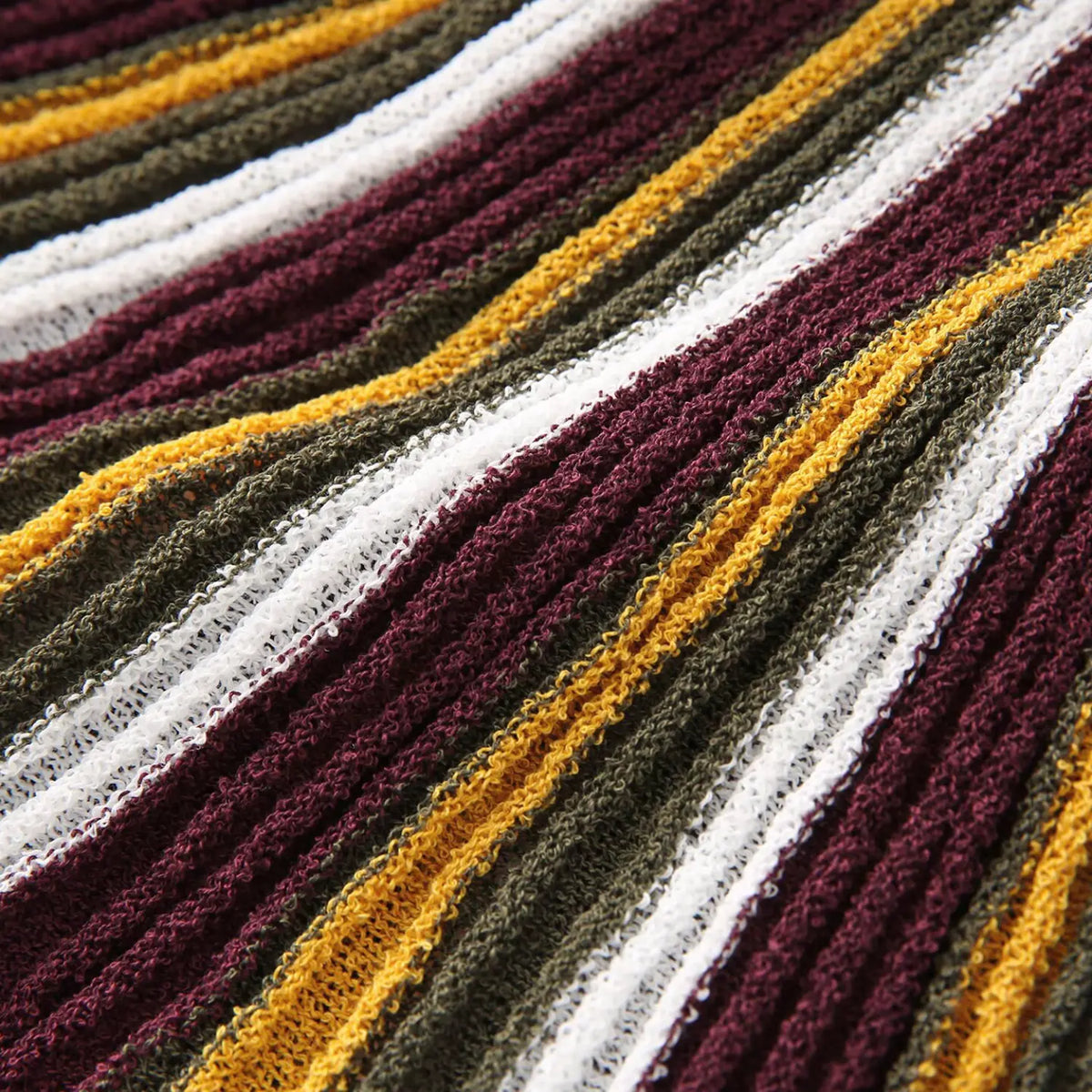 Close-up of burgundy olive striped crinkle knit texture