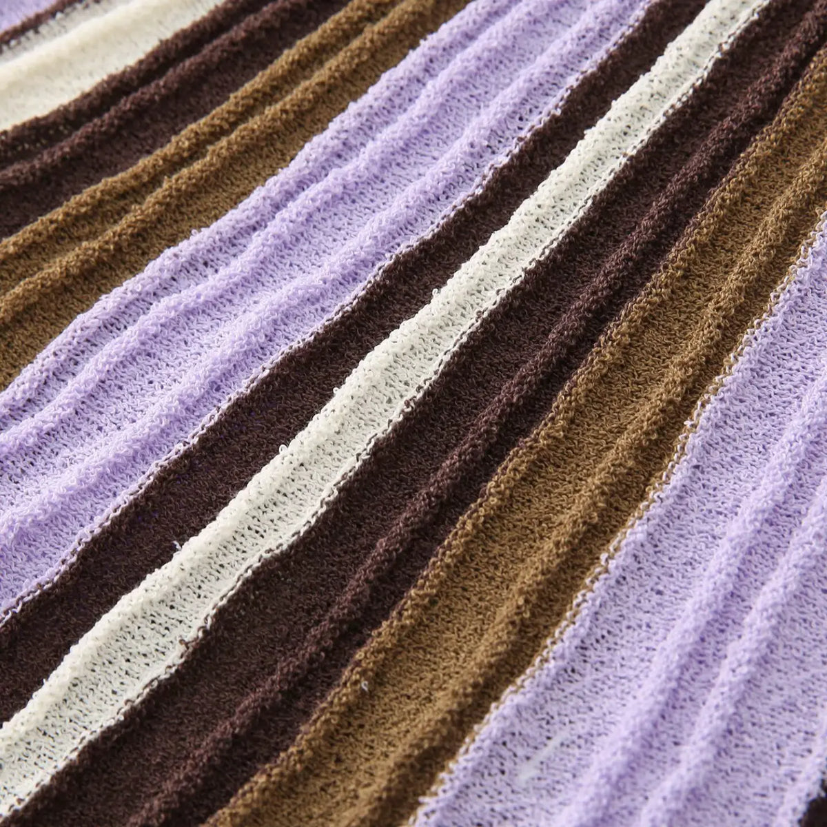 Close-up of lavender brown striped crinkle knit texture