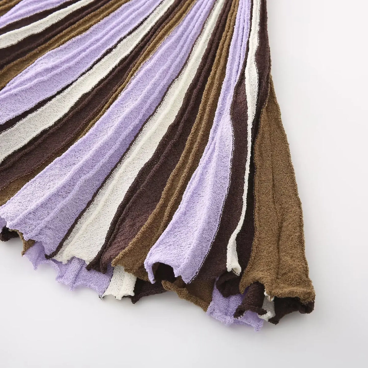 Close-up of lavender brown striped A-line skirt flow