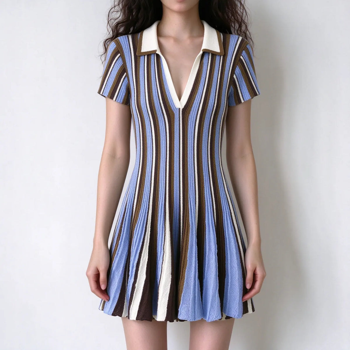 Model wearing blue brown striped polo collar knit mini dress, front view