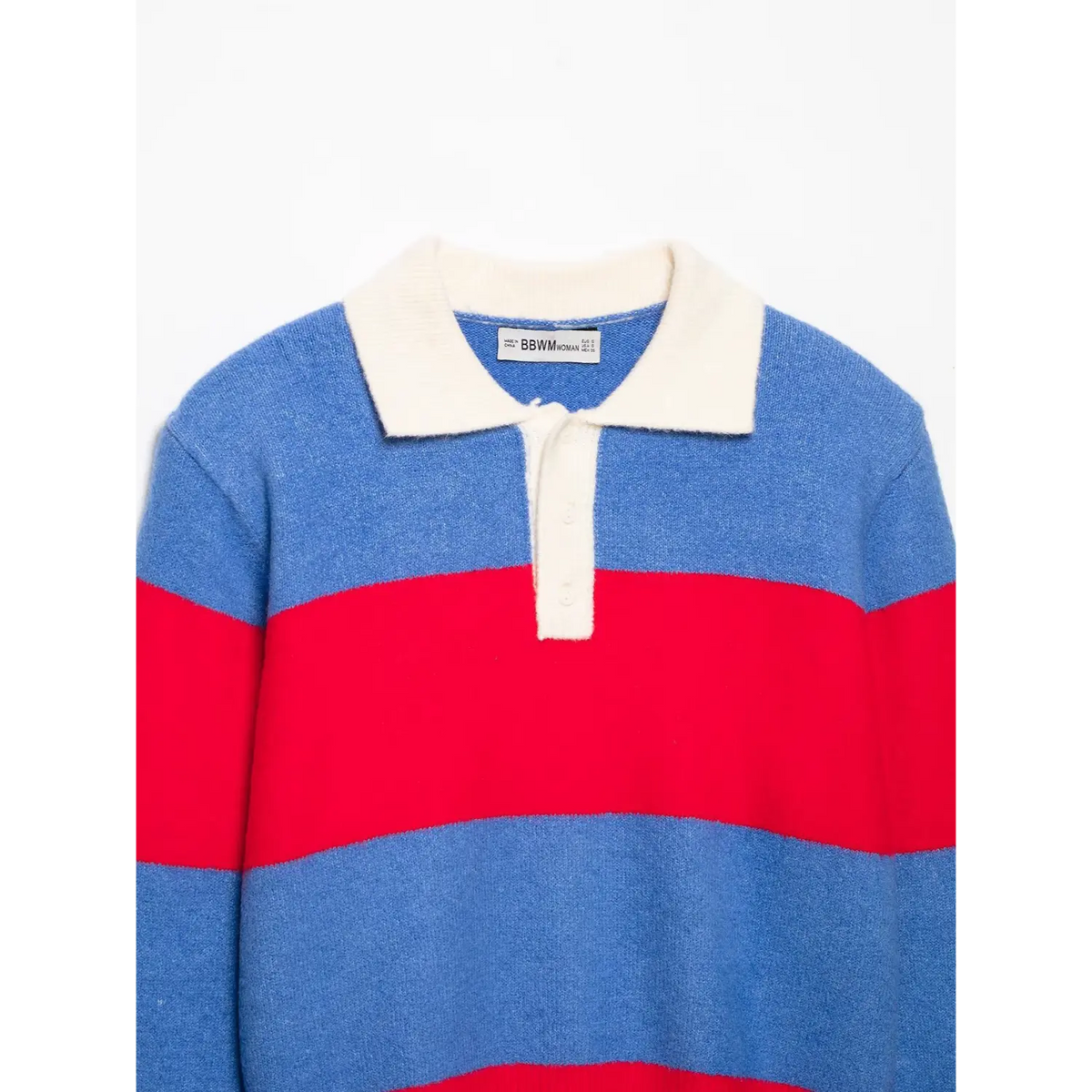Close-up of polo collar and button placket on blue and red striped knit top with white brand label