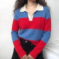 Model wearing striped polo collar knit top with white collar and buttons, paired with black trousers