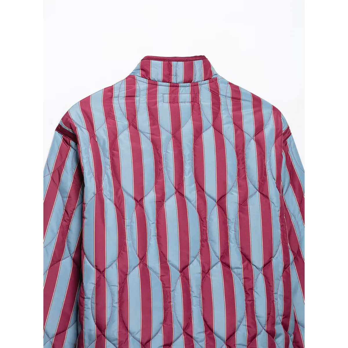 Close-up of back mandarin collar and label tab on striped quilted jacket