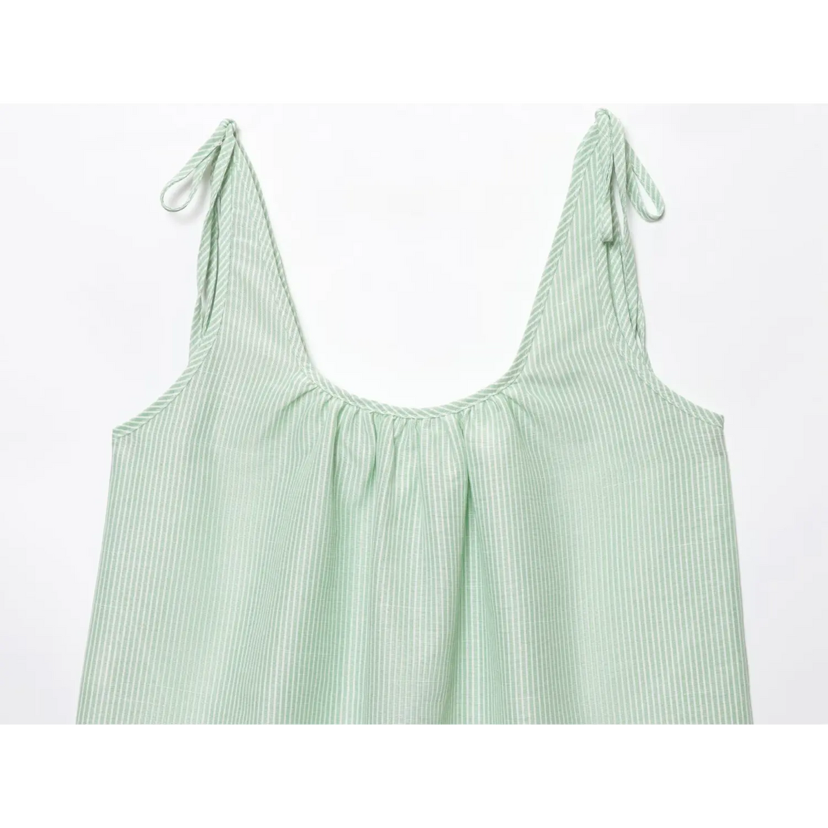 Close-up of back scoop neckline and tie straps