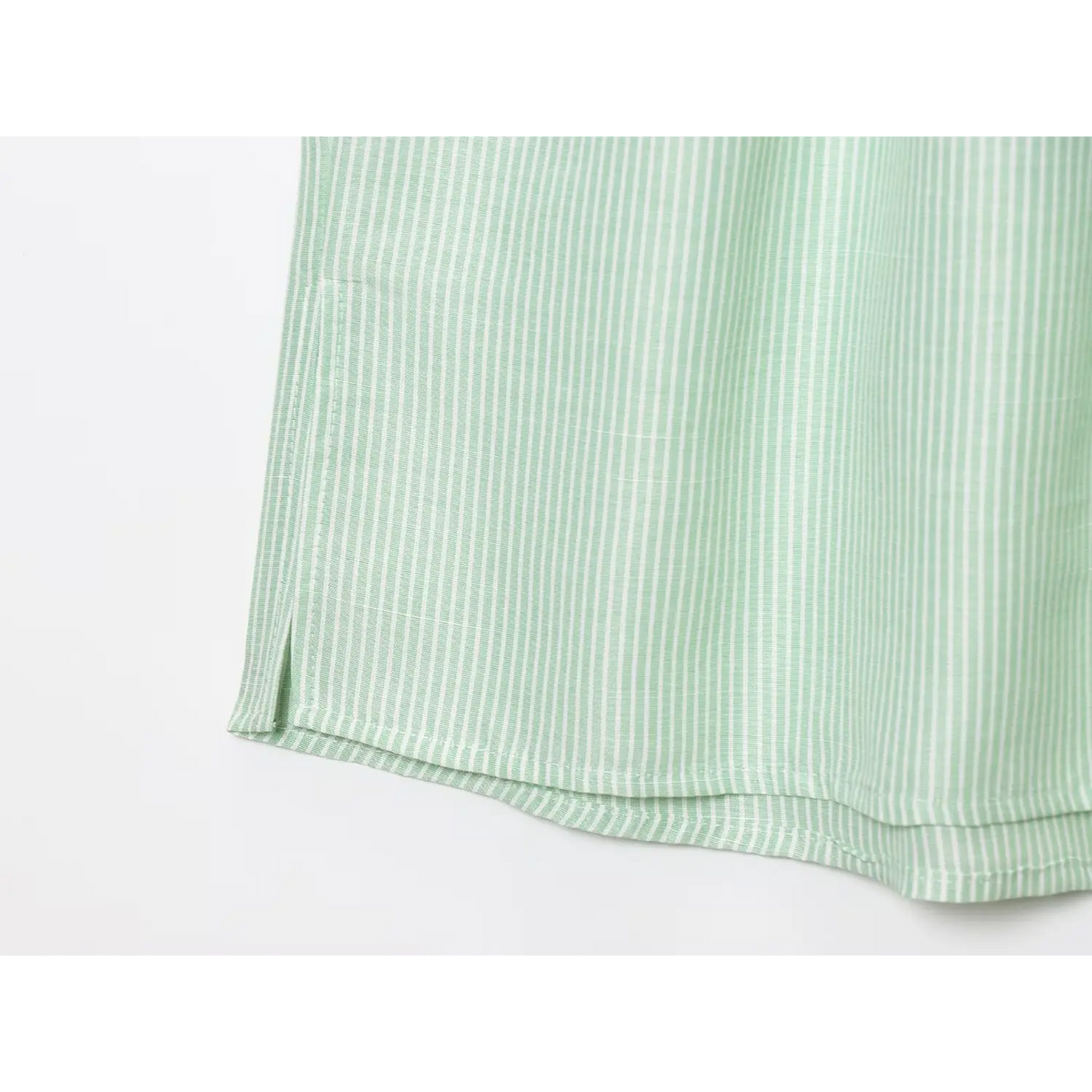 Close-up of left side slit and hem stitching