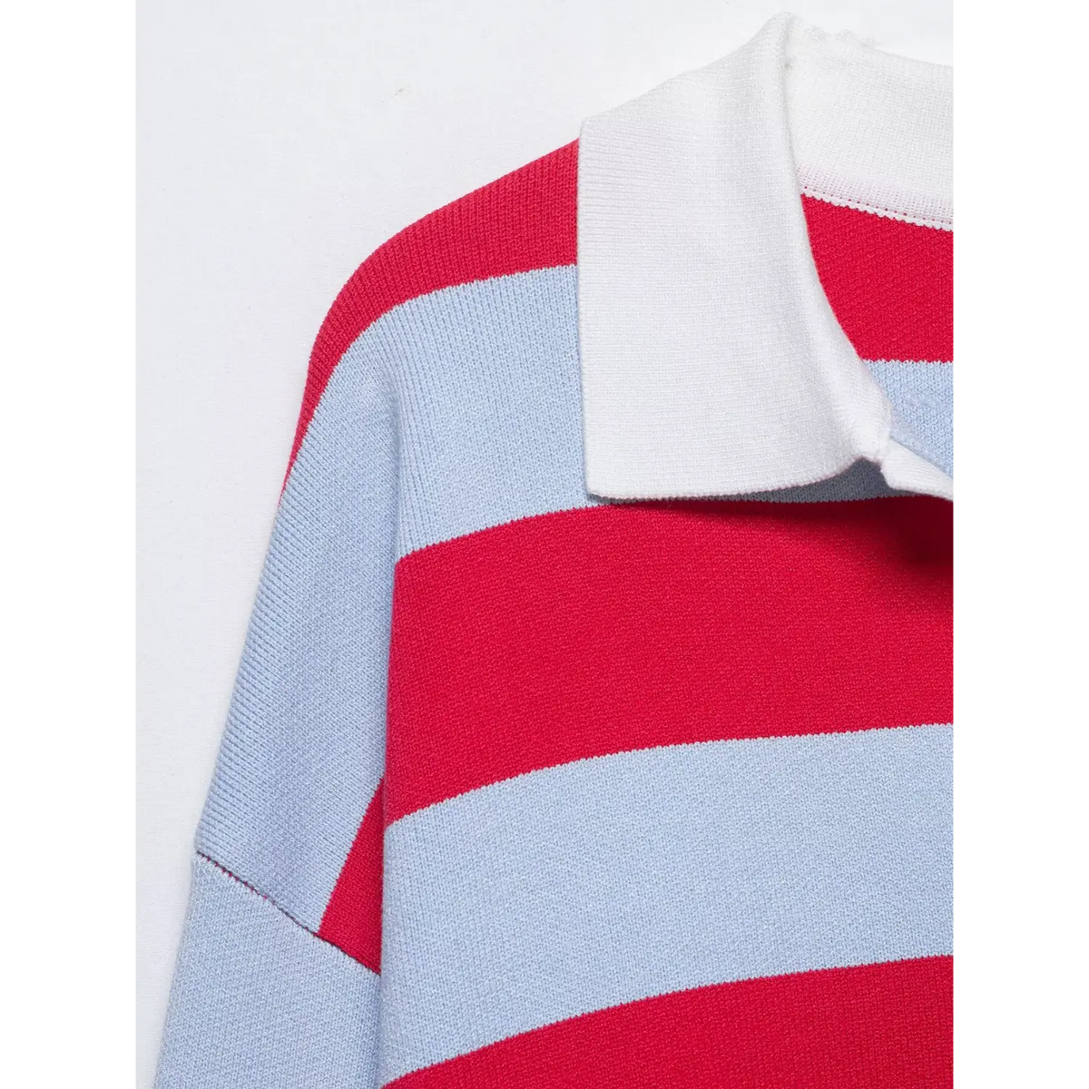 Close-up of white spread collar and drop shoulder stripe