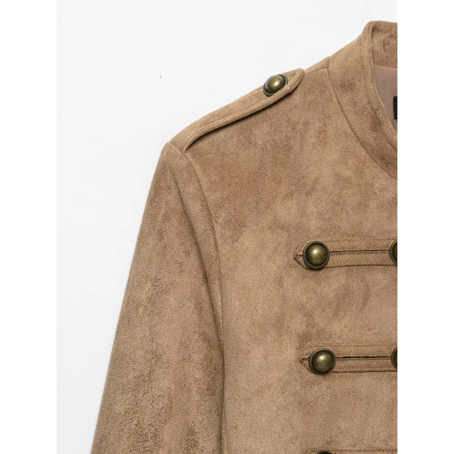 Close-up shoulder detail, epaulet with vintage metal button on khaki faux suede military jacket