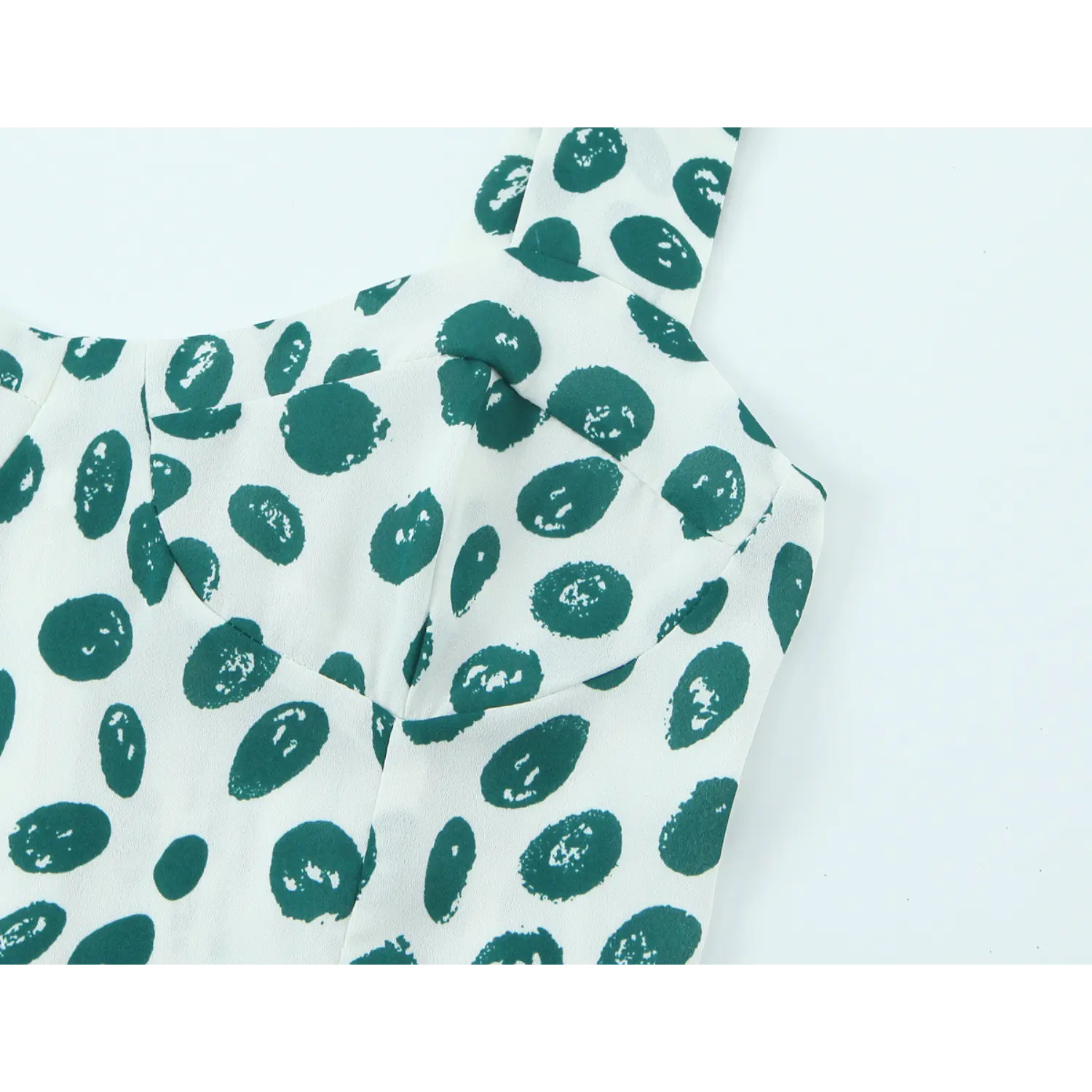 Upper bust partial shot sweetheart square neck cami midi dress, wide matching green dot printed straps, structured bust seaming, minimalist irregular brushstroke polka dot print