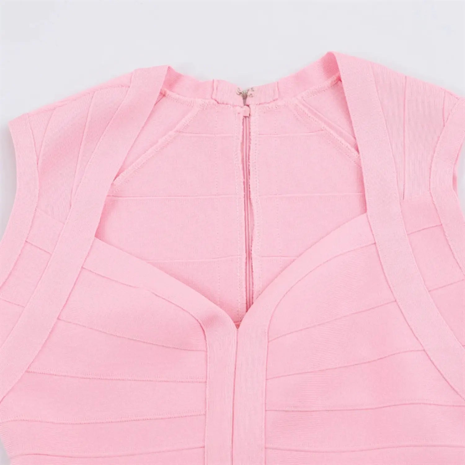 Upper torso partial close-up, sweetheart wrap V neckline, wide bandage trim, central back zipper layout, fine stretch knit texture