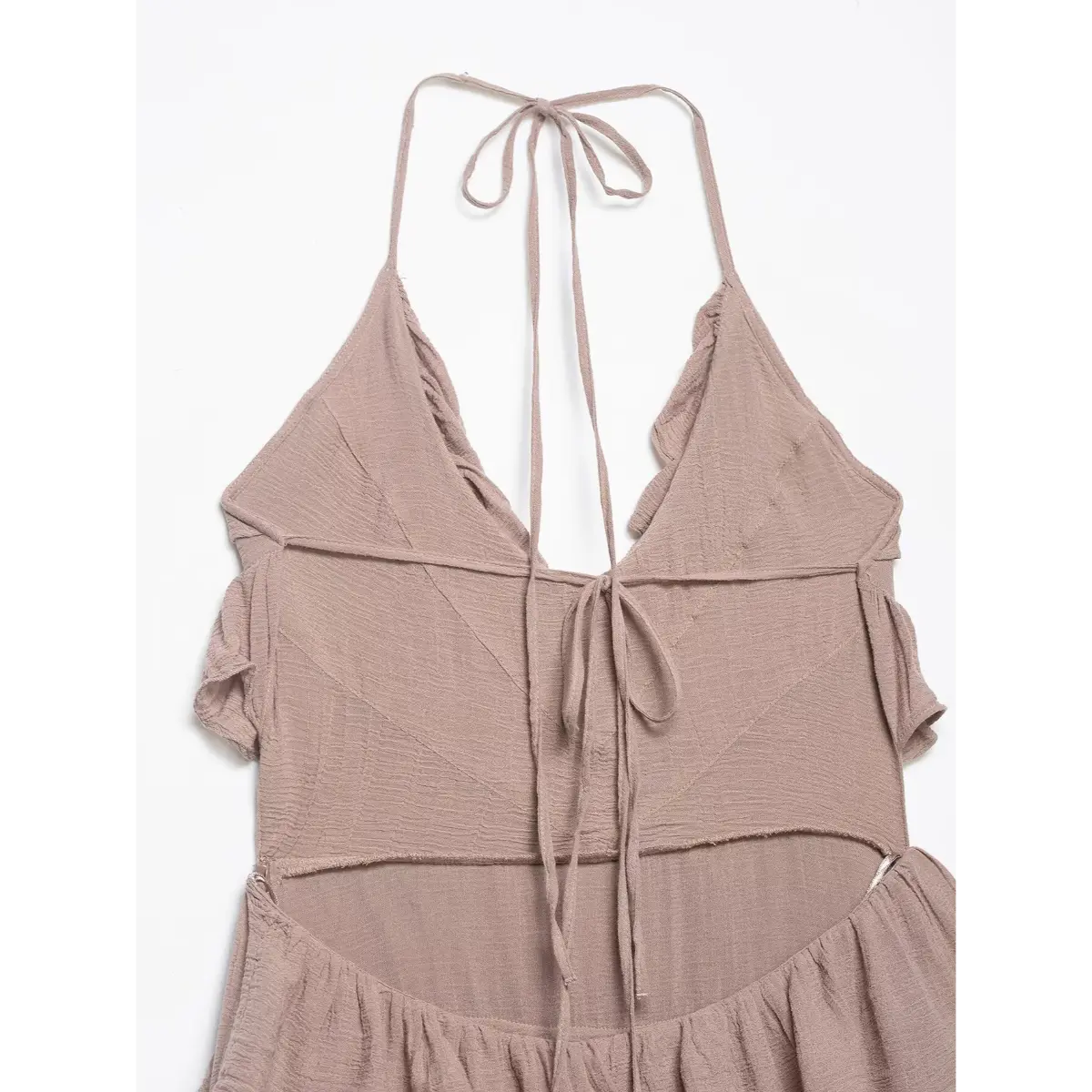 Close-up of the halter tie and front neckline detail on the taupe tiered ruffle dress