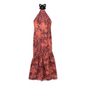 Flat‑lay front view of terracotta floral print halter midi dress with black tie neck and tiered ruffle hem