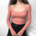 Studio model front view terracotta ultra scoop neck long sleeve fitted knit bodysuit