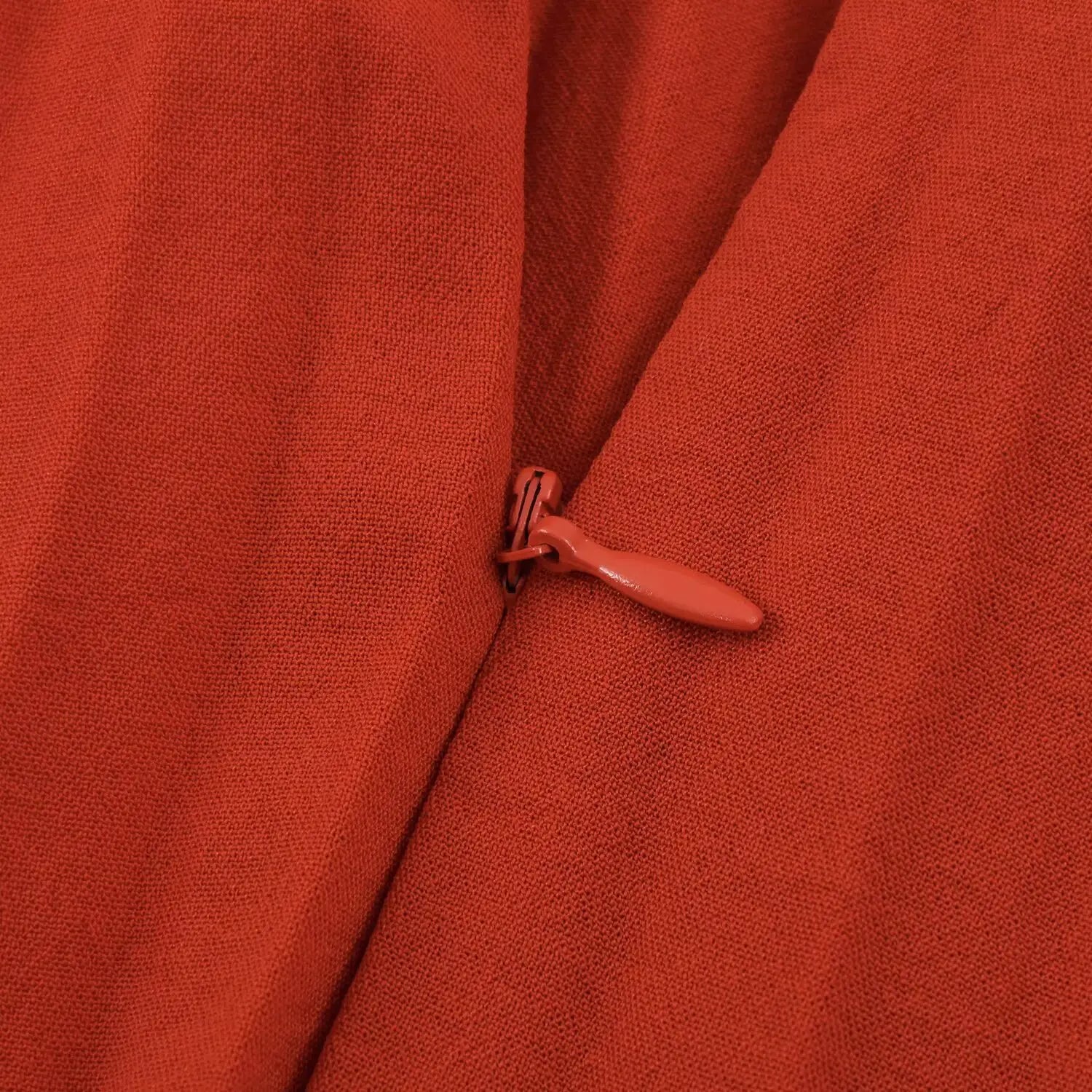 Macro close‑up of concealed side zipper detail