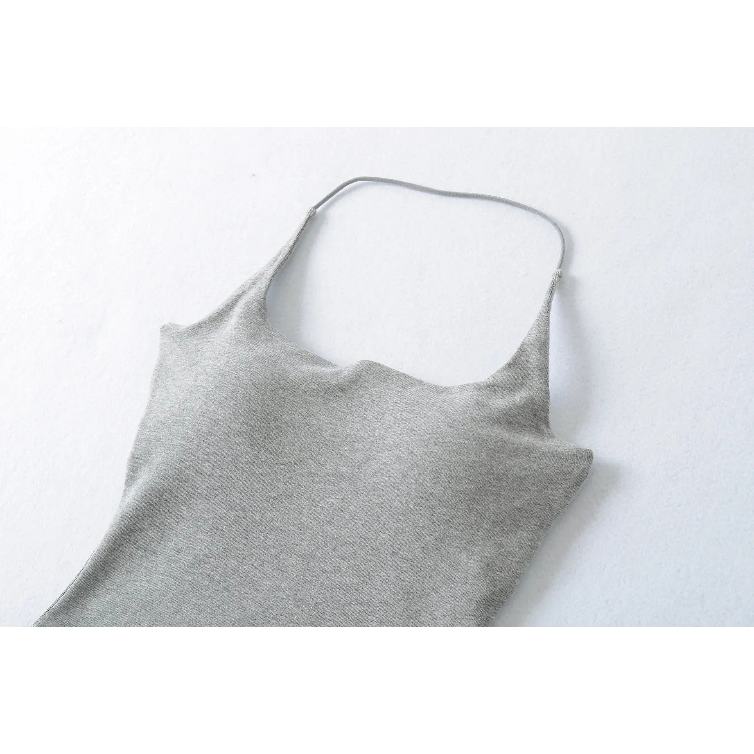Thin halter strap square neck knit cami hanger close-up flat lay, thin seamless halter tie U wide square neck soft feminine neck fit shot