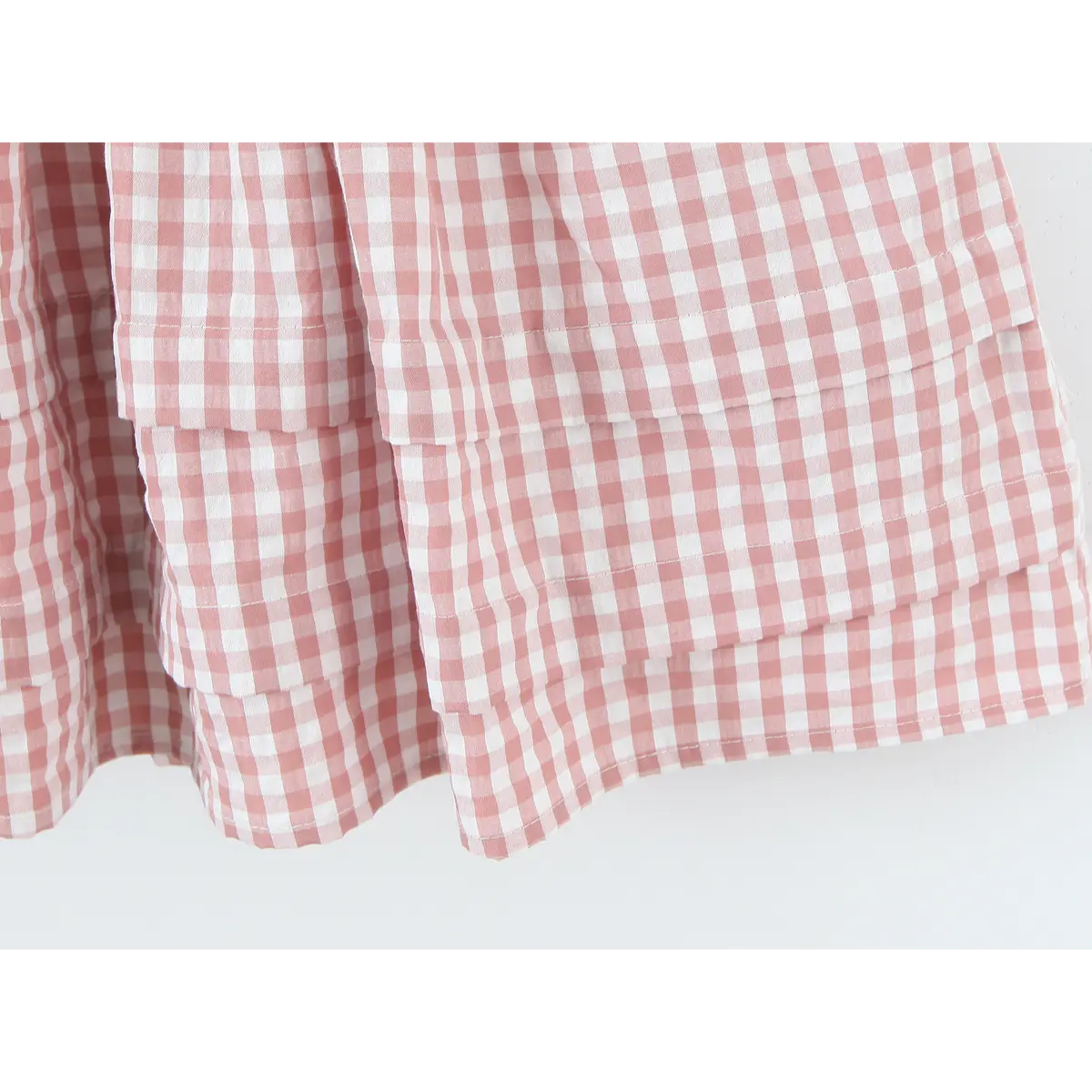 Multi-layer ruffle skirt hem stitching close view