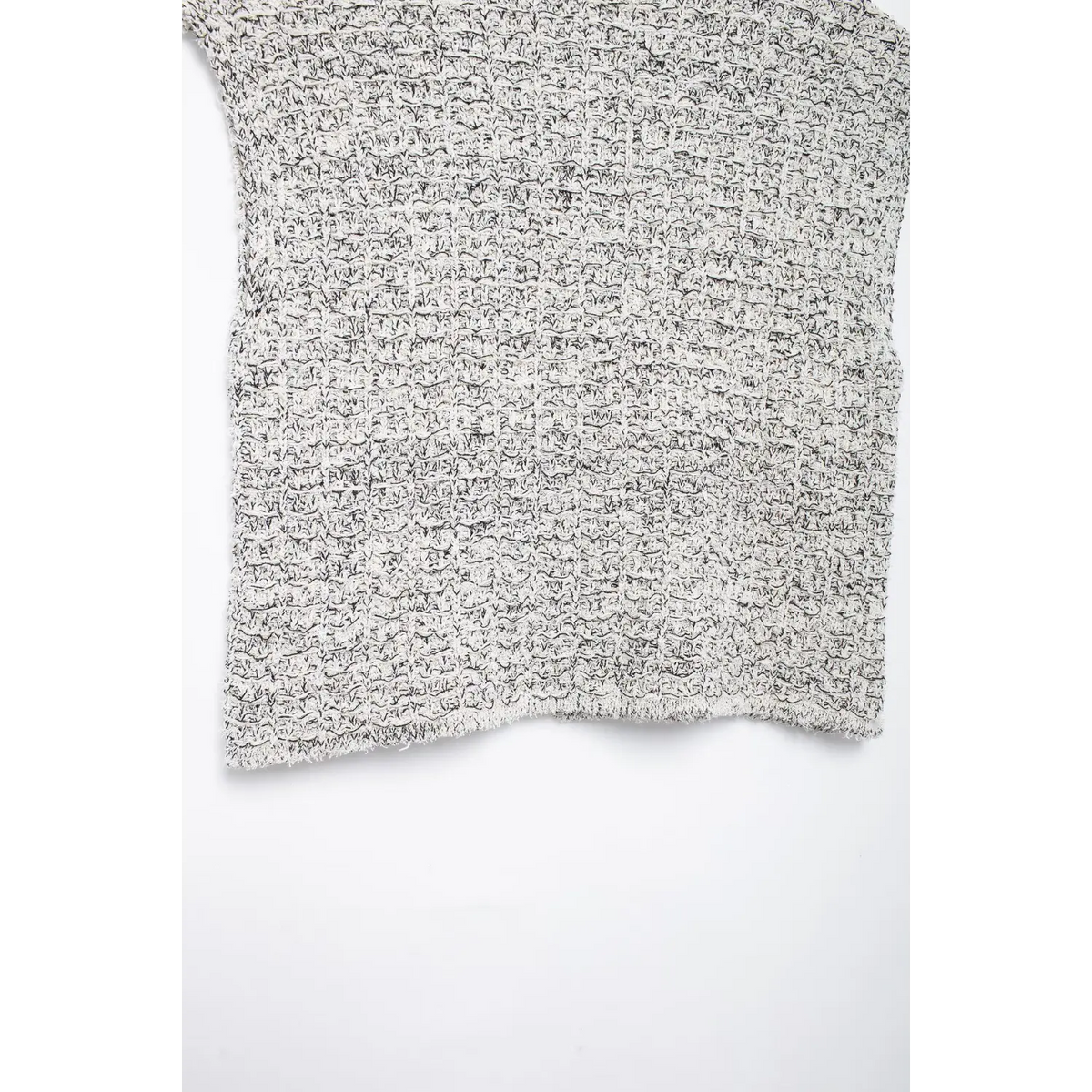 Close-up of tweed texture and hem