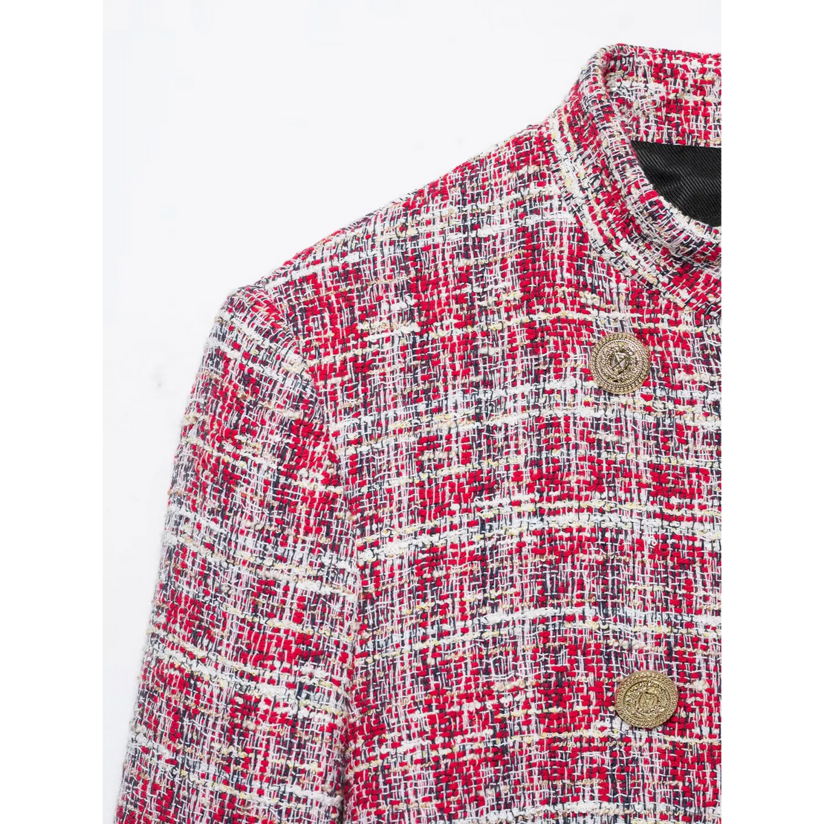 Close-up of stand collar shoulder and gold buttons