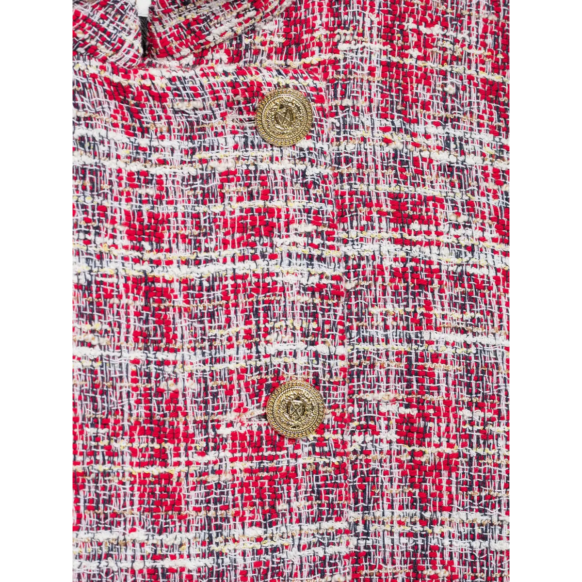 Close-up of tweed weave and gold button