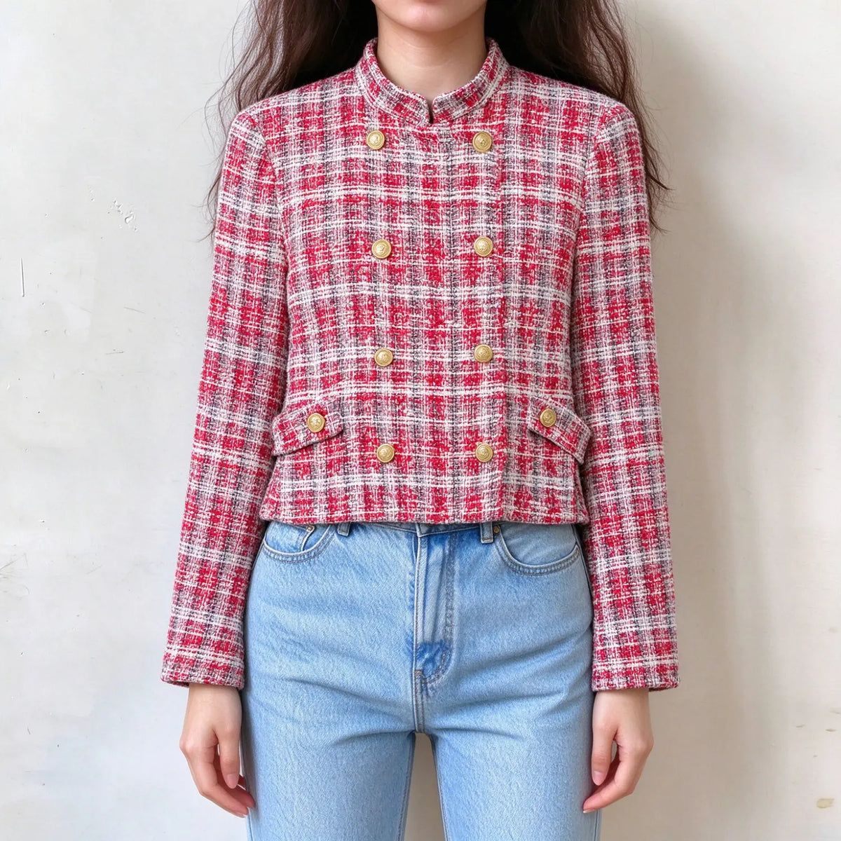 Model wearing tweed double breasted cropped jacket, front view