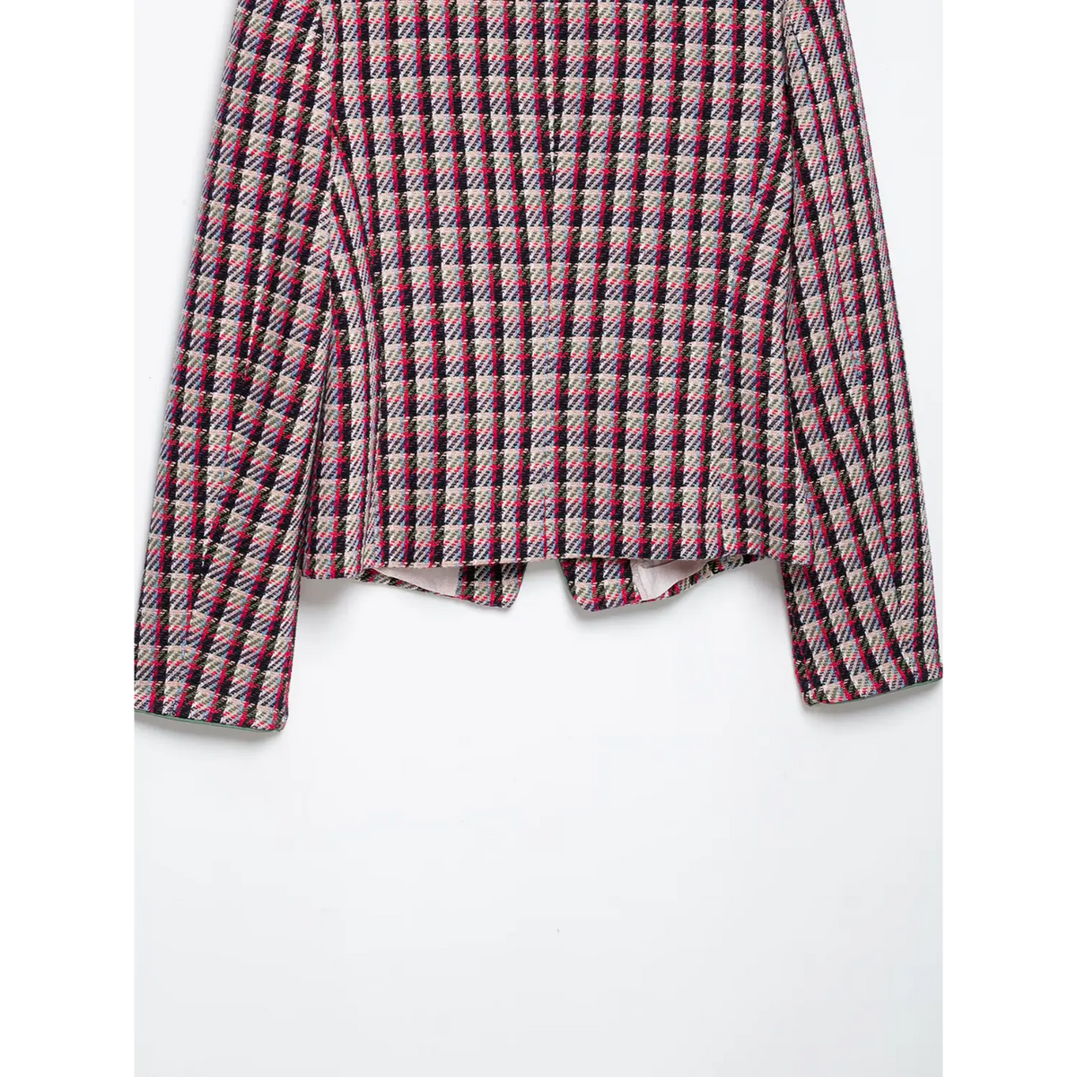 Close-up of jacket hem, long sleeves and light lining on plaid tweed outerwear