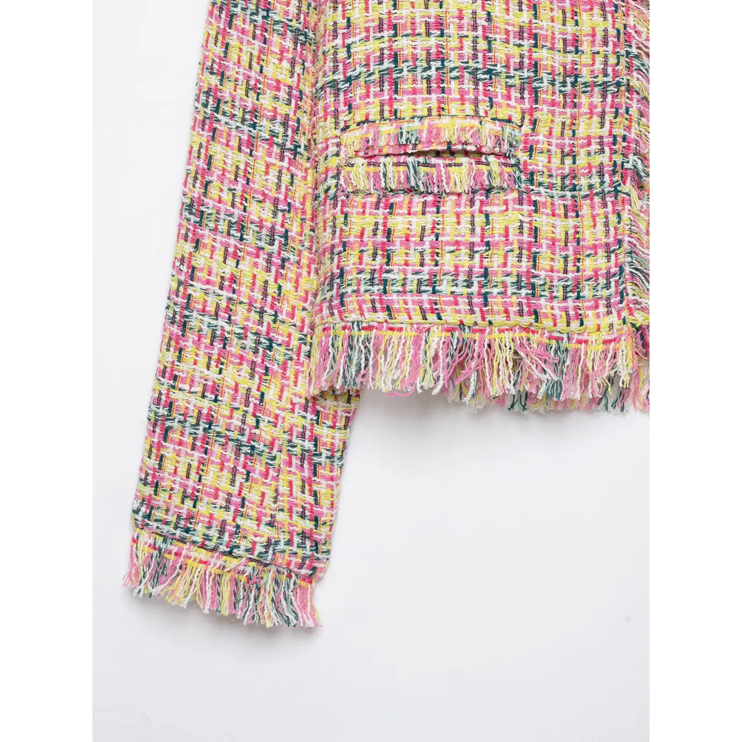 Closeup sleeve cuff, hem fringe and faux pocket colorful tweed jacket