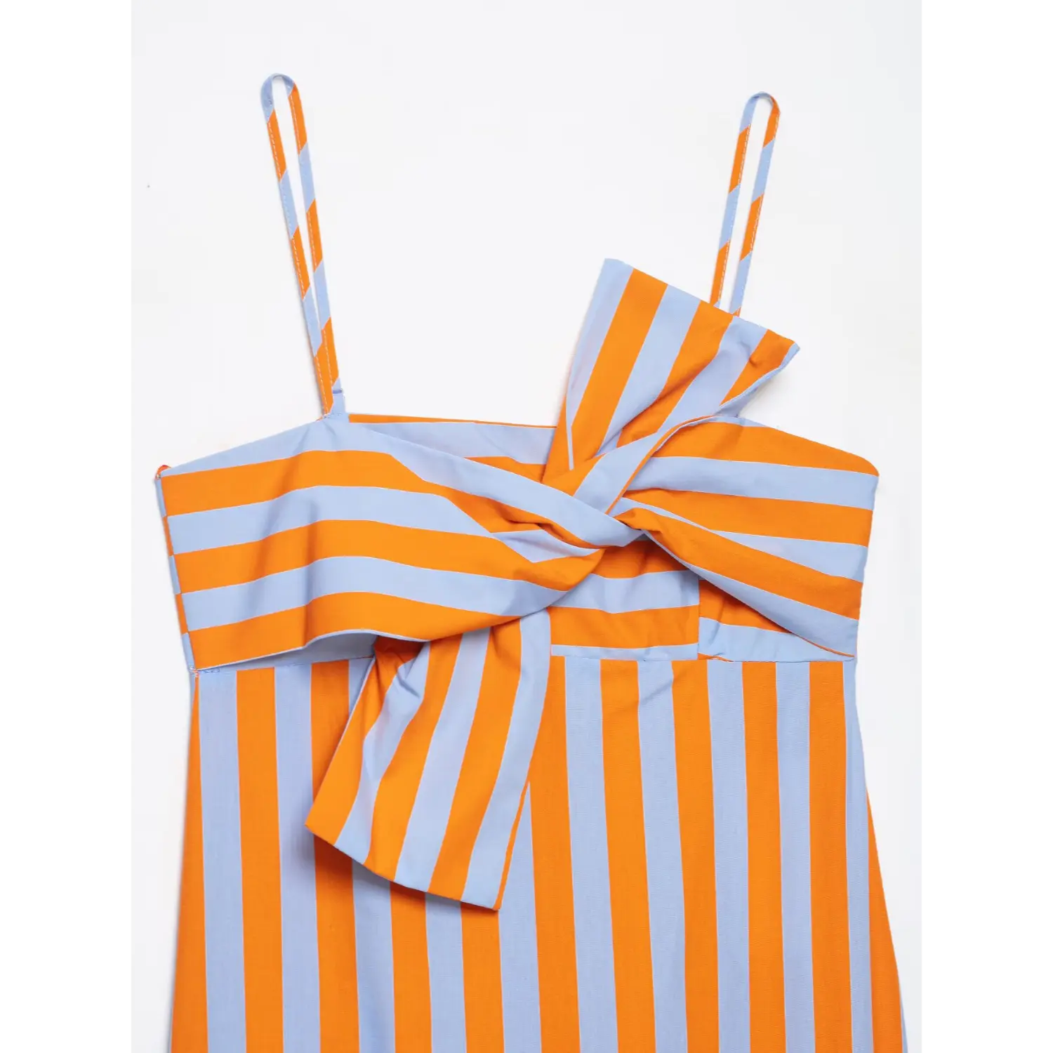 Extreme close-up front decorative twist knot design on striped spaghetti strap maxi dress bust