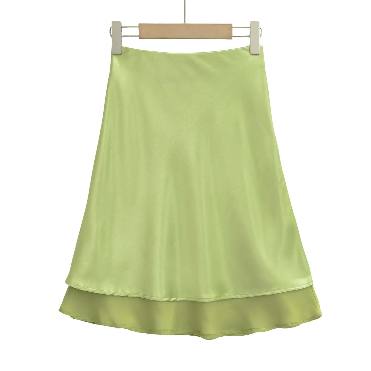 Two-tier hem satin & mesh joint macro close-up, offset length outer satin & inner mesh wavy overlock binding lightweight zero burden layered fabric craft shot