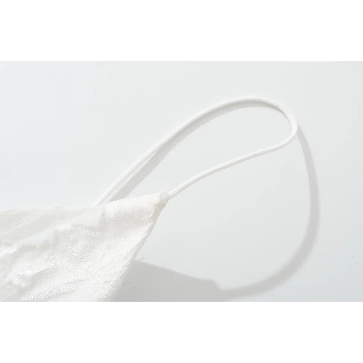 Super thin cami strap end stitching detail shot