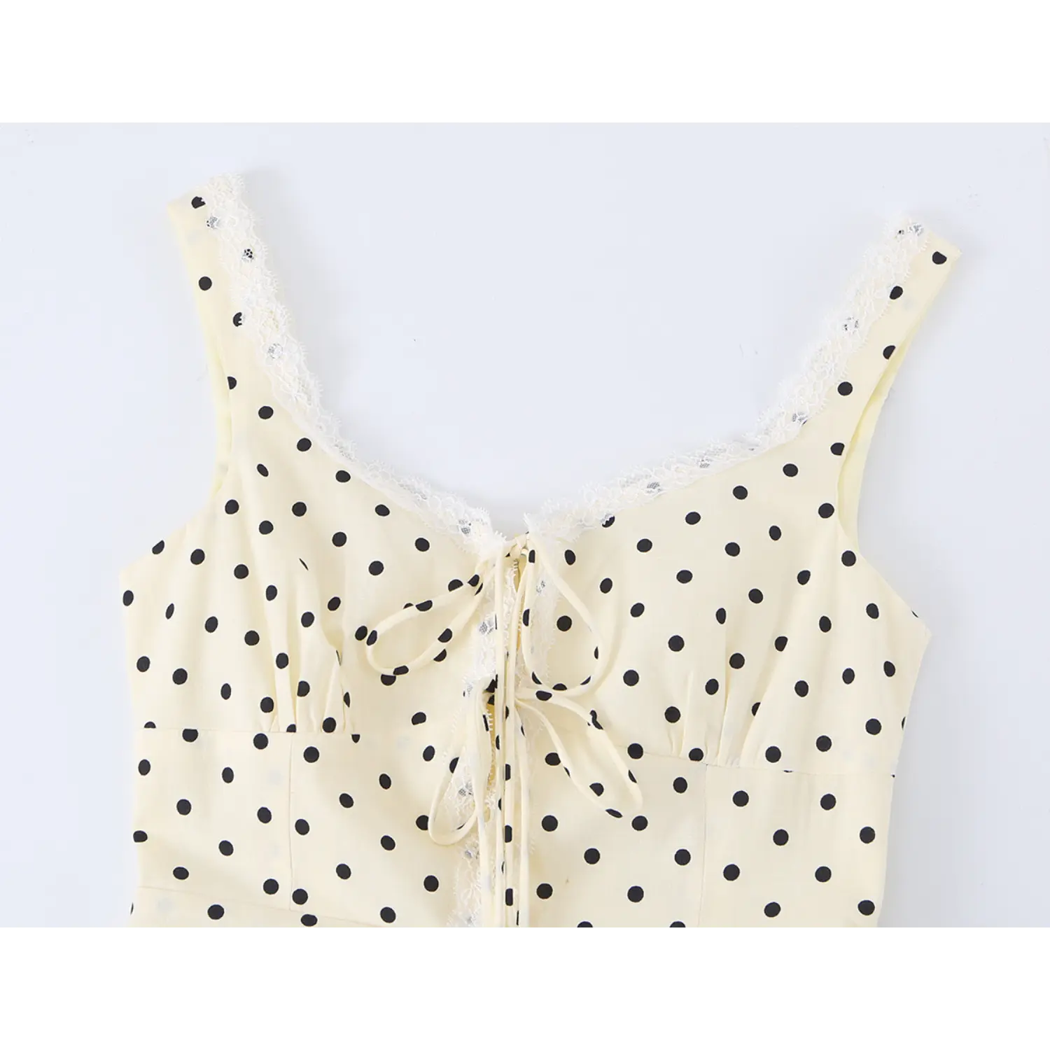 Front neck & bust close-up, delicate white scalloped lace trim, lace self tie bow, polka dot woven fabric