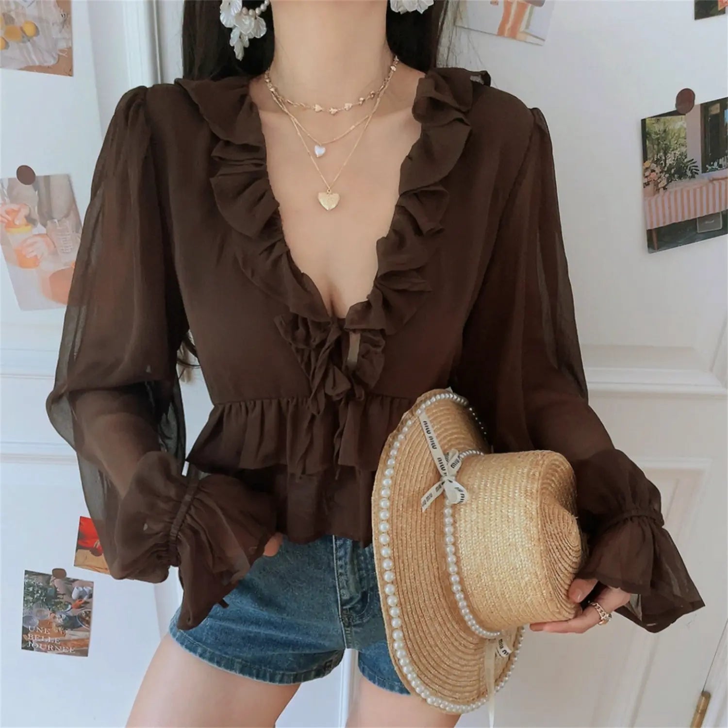 V neck sheer ruffle crop top front close-up model detail shot, clear display chiffon sheer texture double neck frill front drawstring layered ruffle hem tie flare sleeve slim silhouette detail display