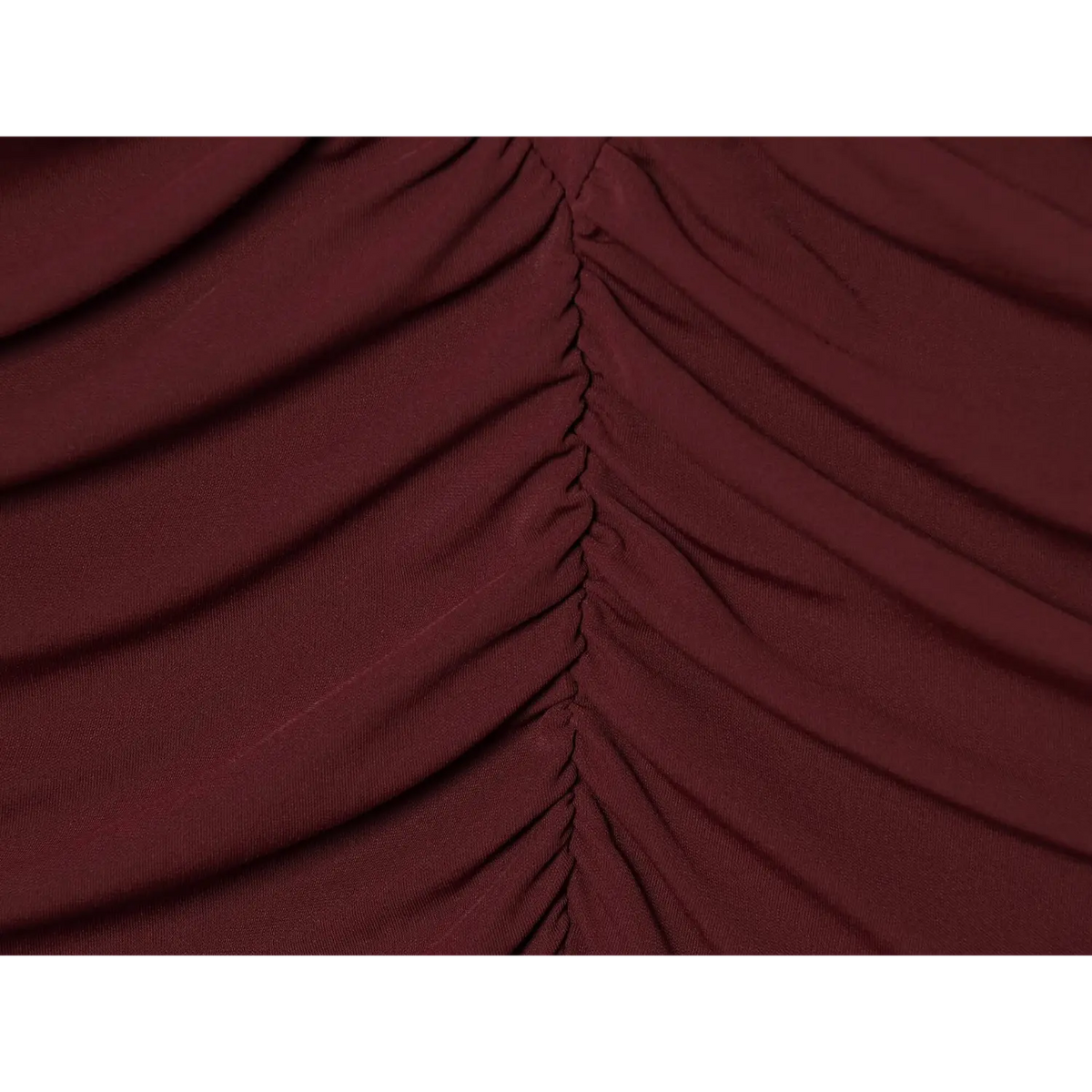 Close-up of burgundy ruched seam detail