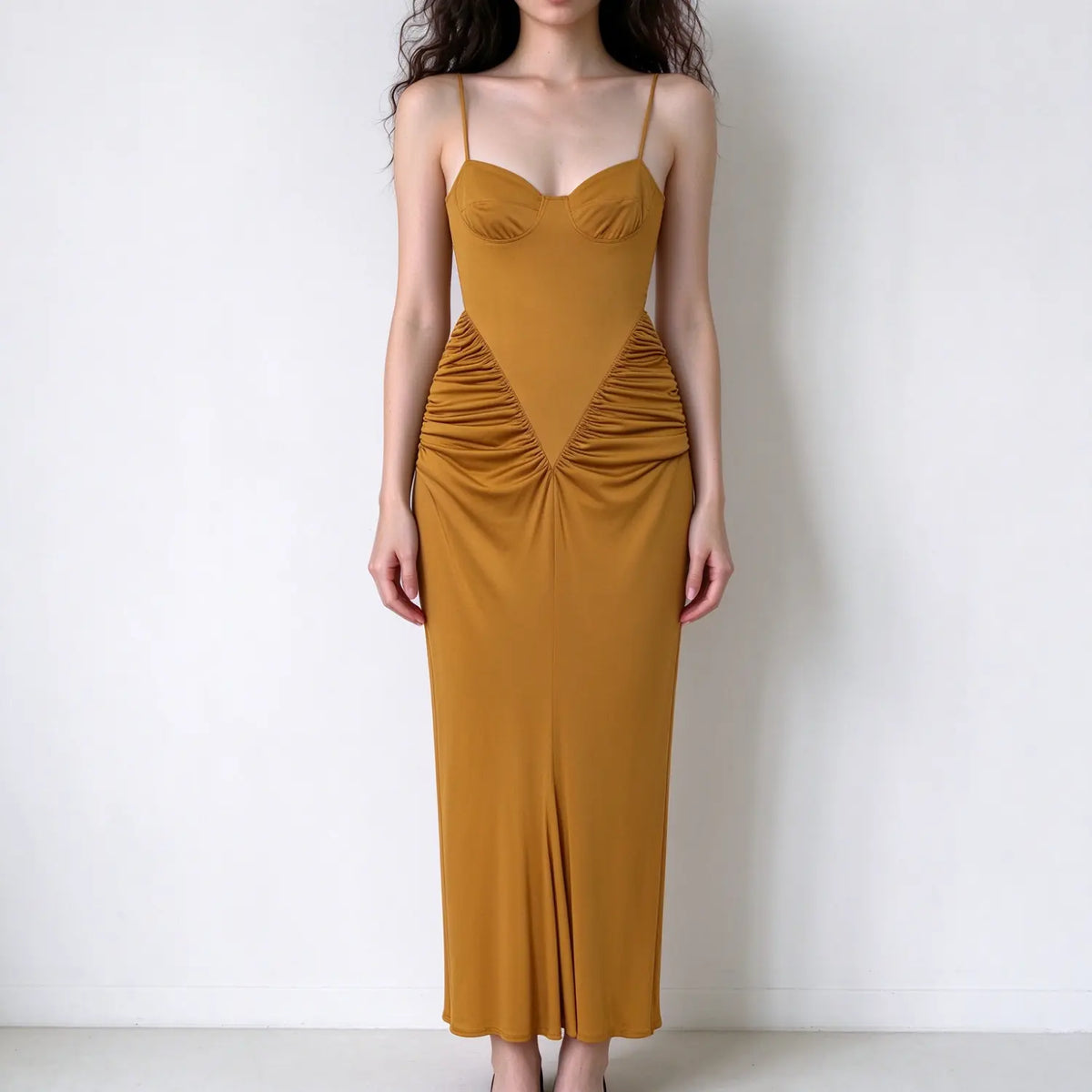 Model wearing mustard V-waist ruched sweetheart cami midi dress, front view