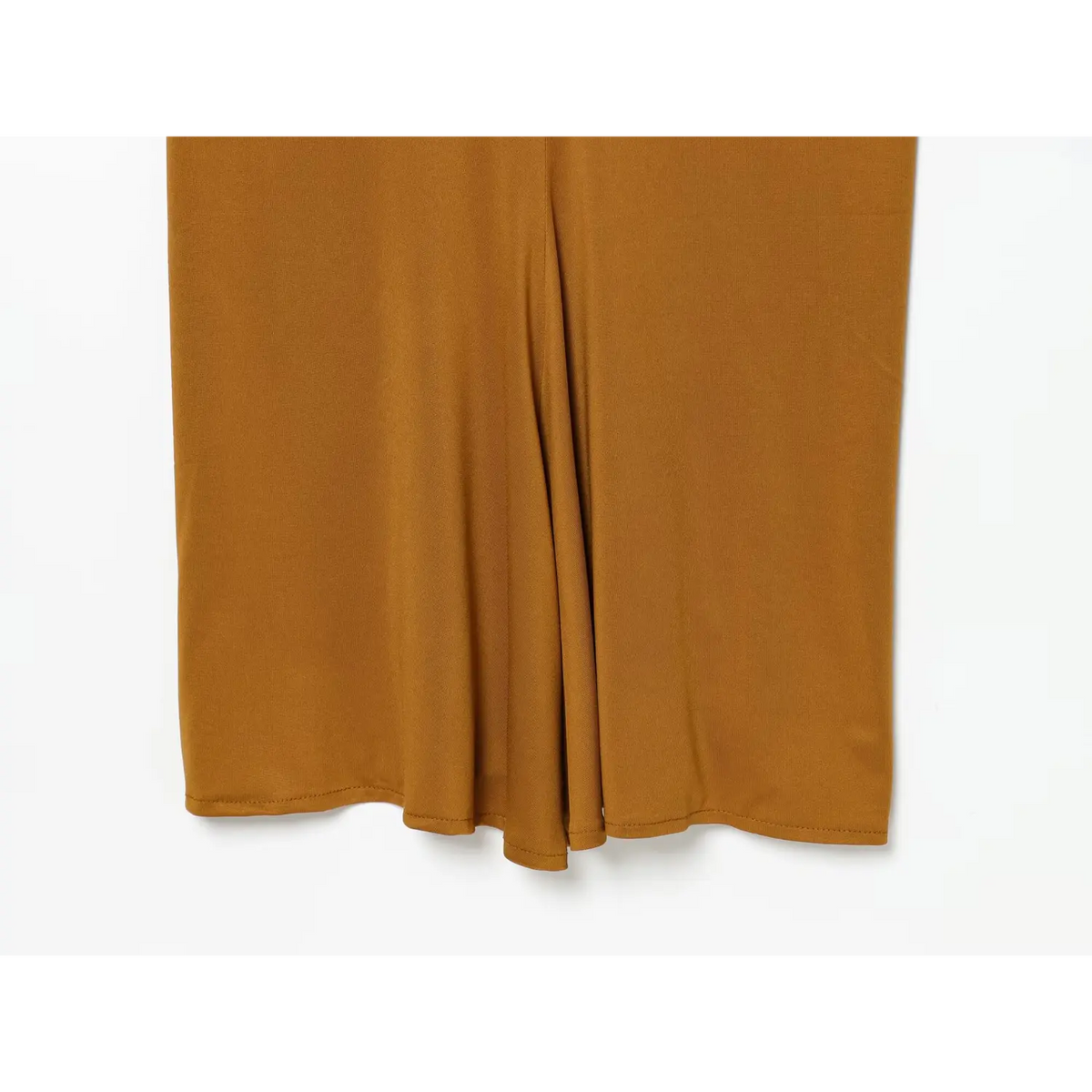 Close-up of mustard front slit hem