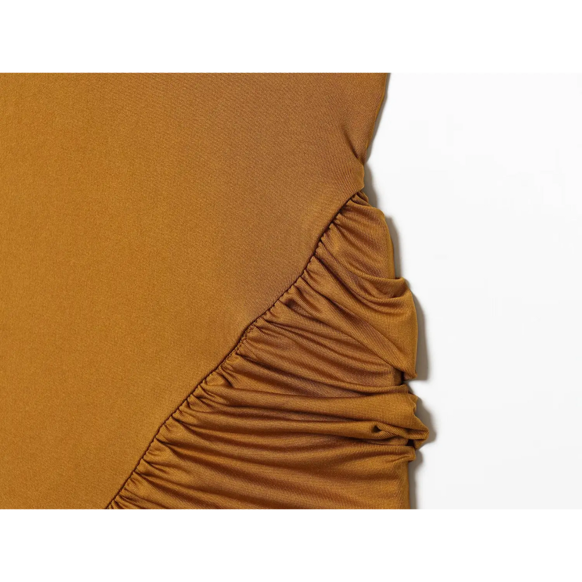 Close-up of mustard side ruched detail
