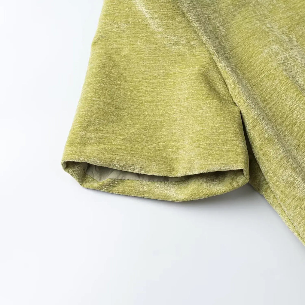 Close-up of green short sleeve cuff