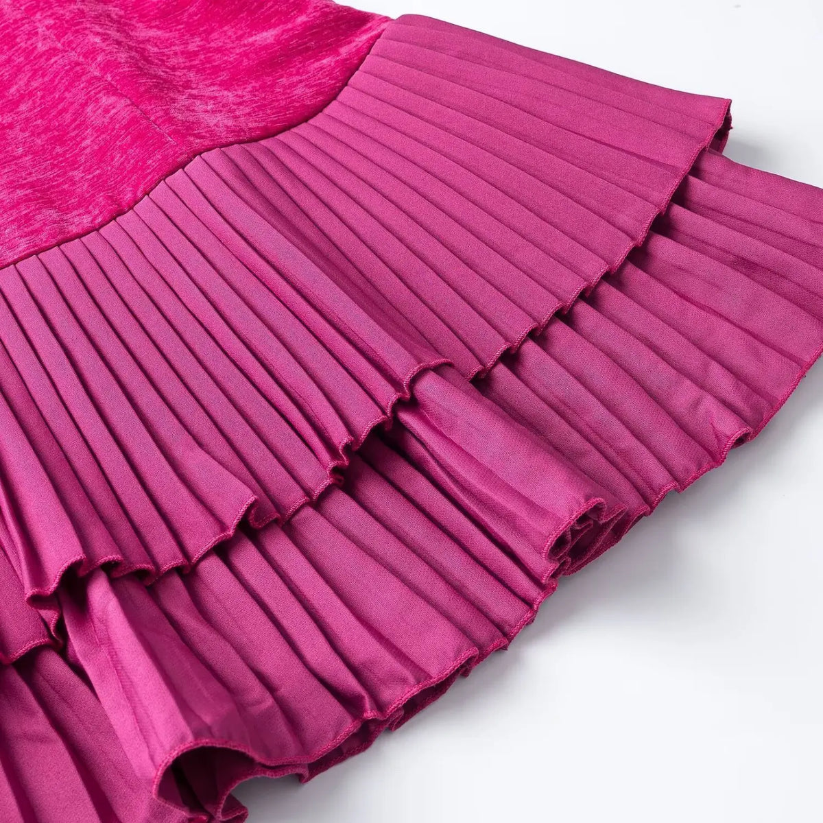 Close-up of fuchsia double layer pleated ruffle hem