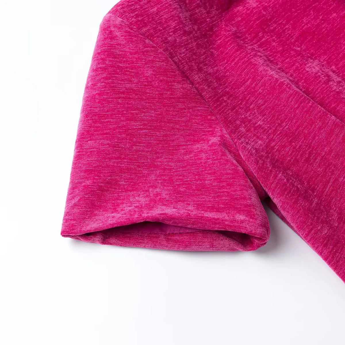 Close-up of fuchsia short sleeve cuff