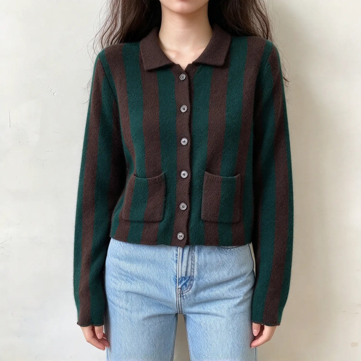 Model wearing vertical stripe collared pocket cardigan with jeans, front view