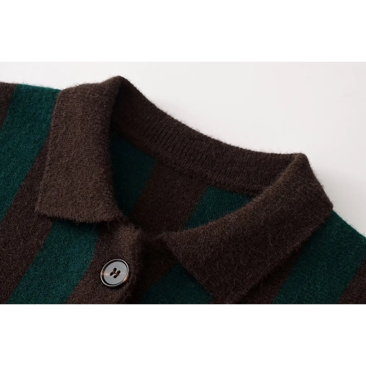 Close-up of collared neckline and button