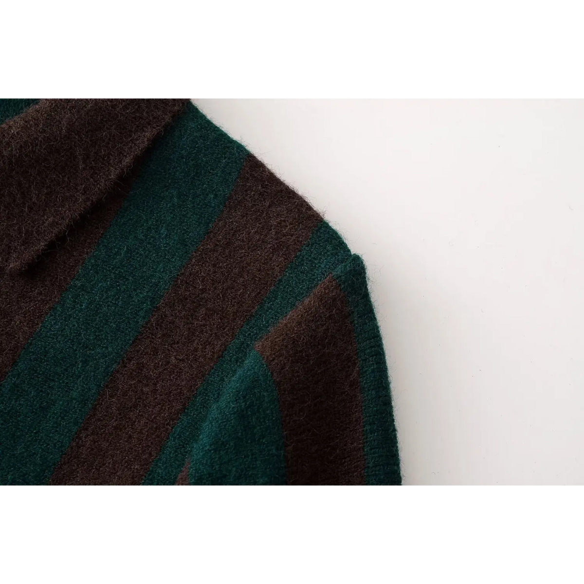 Close-up of shoulder seam and stripe knit