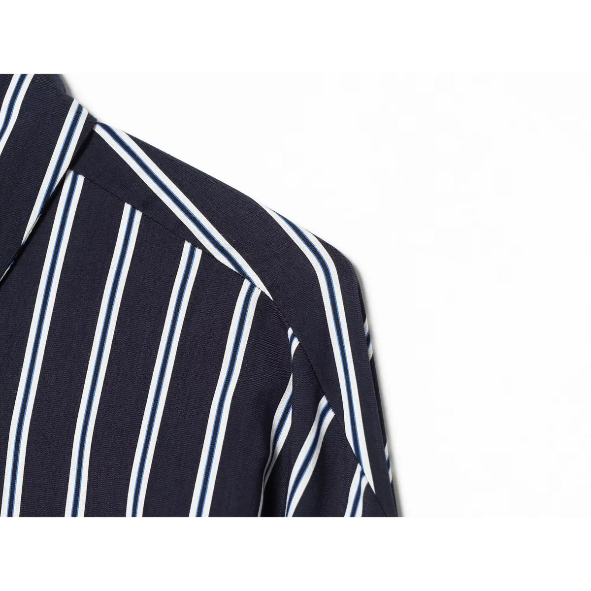 Close-up of drop shoulder seam on navy stripe shirt