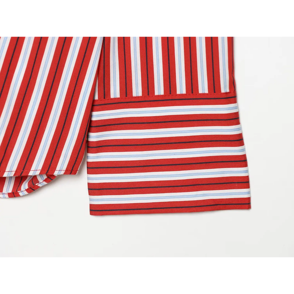 Close-up of horizontally striped wide cuff on red stripe shirt